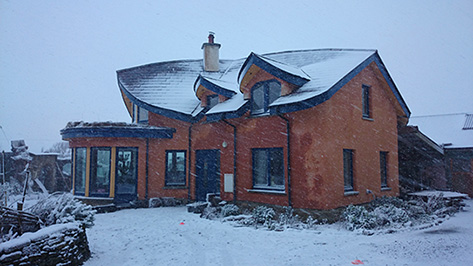 snow at the Mud and Wood House